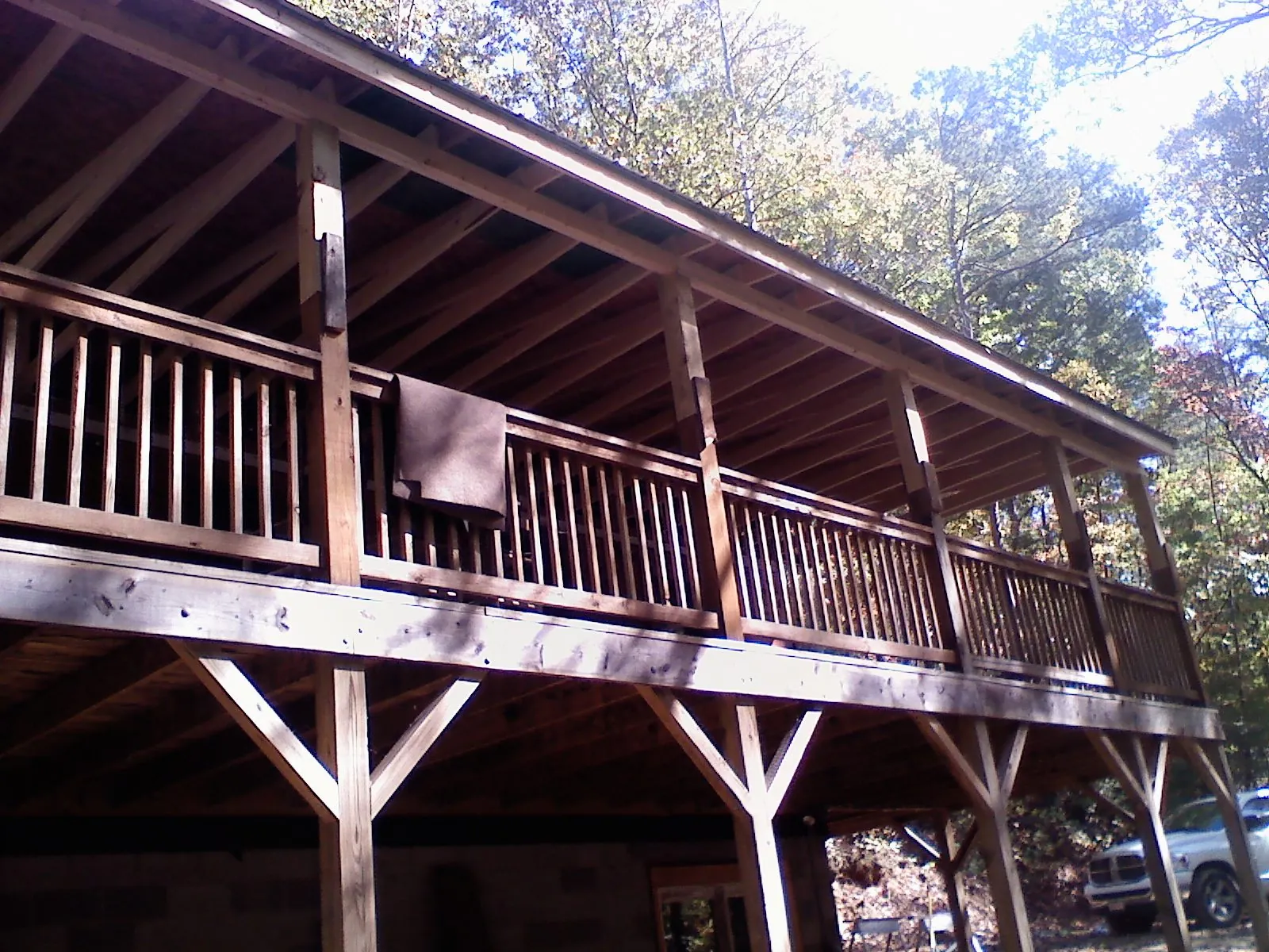 Timber framing under a new elevated porch and deck — Roof Leak Repair in Angier by Roofing Brothers